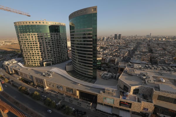 Building from Scrap, Building Through Crisis